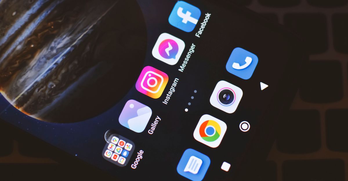 Smartphone screen showing popular social media and app icons including Facebook and Instagram.