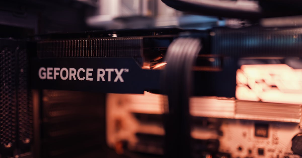 Detailed view of a GeForce RTX graphics card installed in a computer setup, highlighting modern technology.