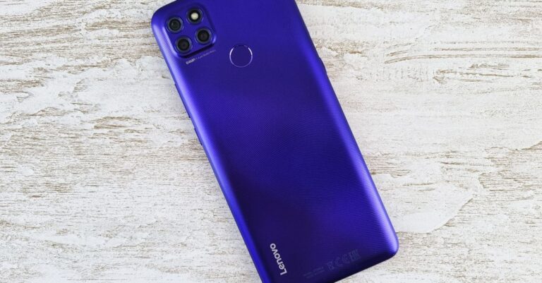 A vibrant blue Lenovo smartphone on a light textured background, showcasing its sleek design and modern technology.